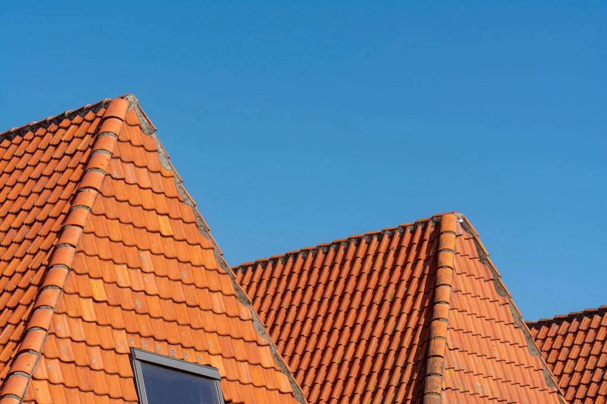 Clay barrel tile rooflines on homes in Muncie, IN